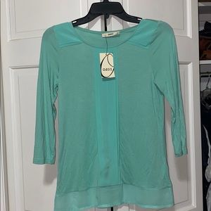 Teal green shirt